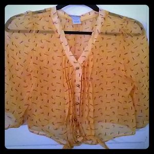 Yellow blouse with pink flowers