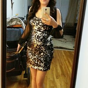 Adrianna appeal black sequin dress open arms