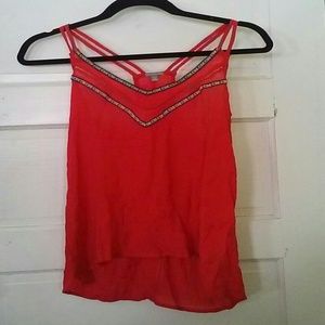 Red tank top with tribal print trim