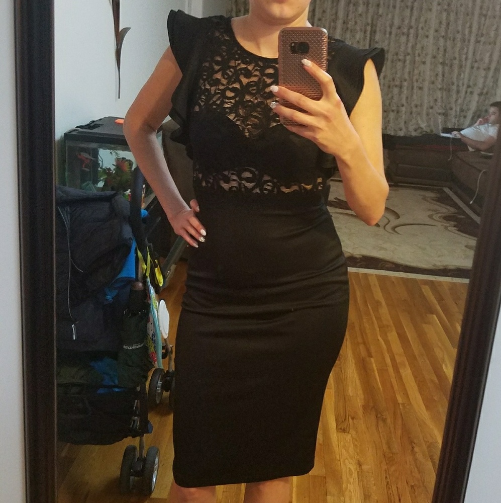Black lace dress with shoulder ruffles