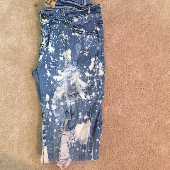 Bleached and distressed denim