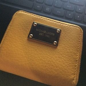 Yellow Michael Kors mini wallet