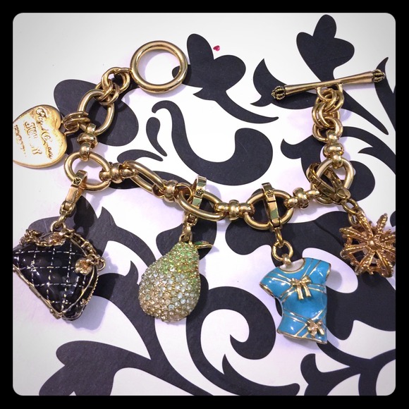 Juicy Couture gold charm bracelet.