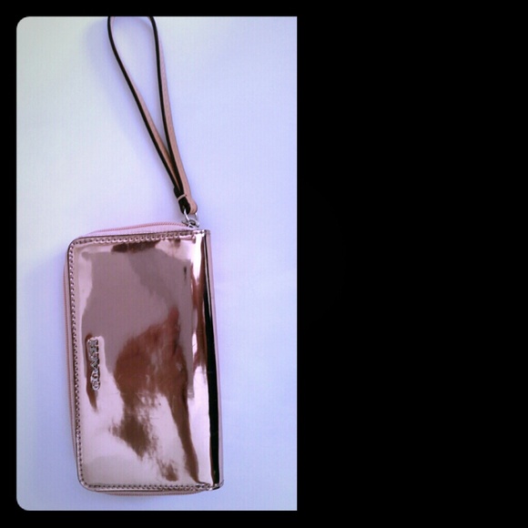 Coach wristlet metallic pink