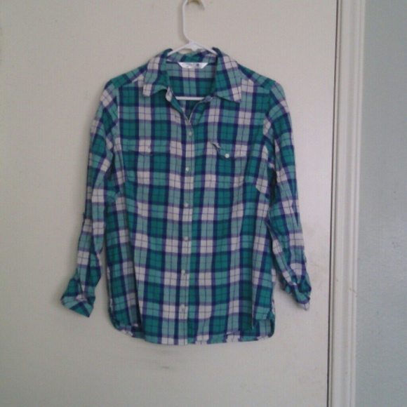 A green/blue button up shirt