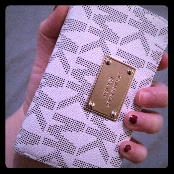 MK vanilla zip around wallet wristlet.