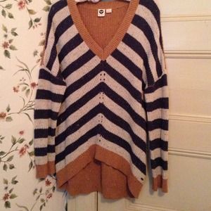 Blue,white and tan striped sweater.