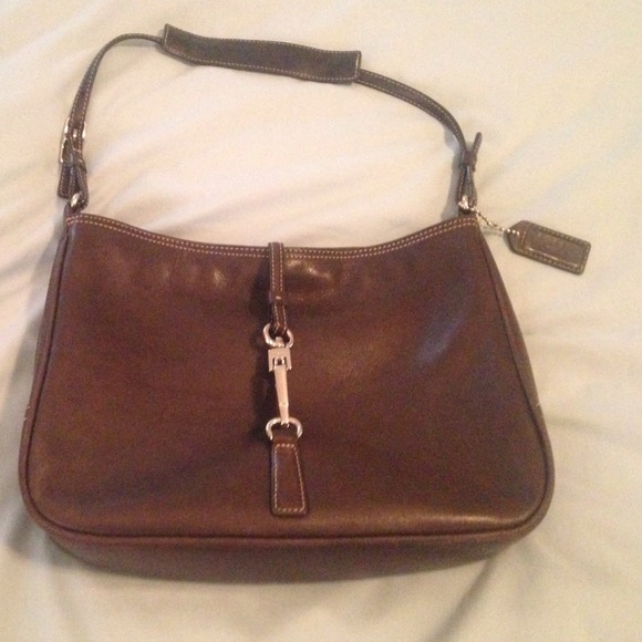 Bundled for stairwell brown authentic coach purse.