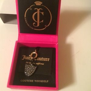 Juicy couture shield charm. Never worn never used.