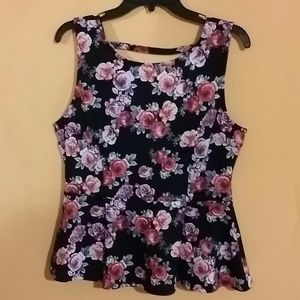 **Sold** Floral peplum shirt from Forever 21
