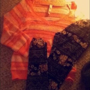 Aero long sleeved sweater and flowery leggings.