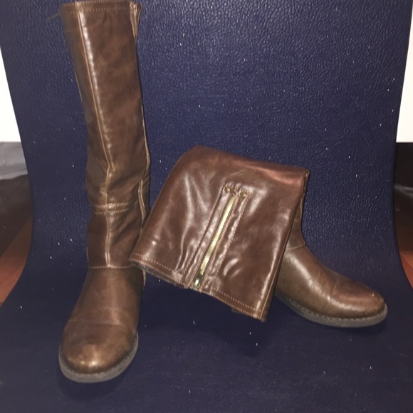 Tall brown riding boots