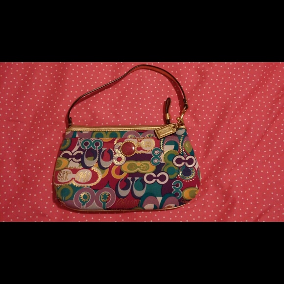 Coach poppy signature C large wristlet.