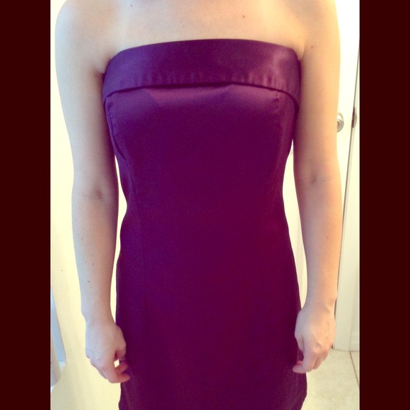 A classic & elegant, satin strapless dress.