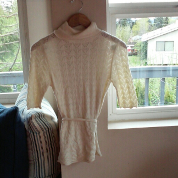 White dotted see through turtleneck sweater