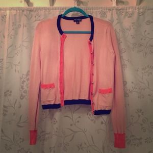 Pink sweater with blue trim