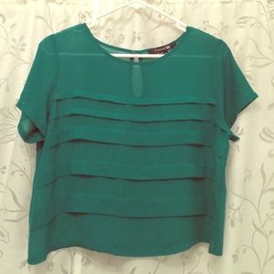 Slightly sheer green blouse