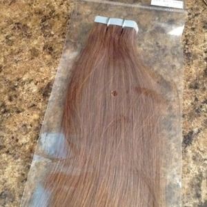 Tape in real hair extensions. 22". Brand new