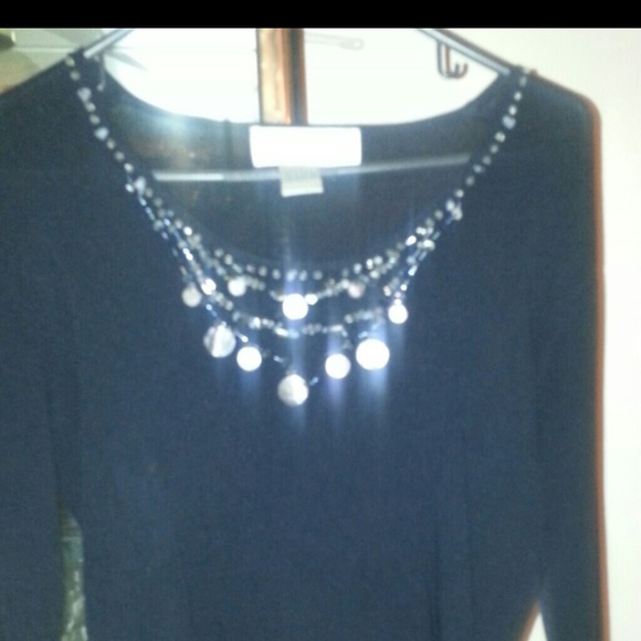 Black sweater with shells . different n stunning!