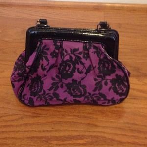 Purple handbag with black flowers