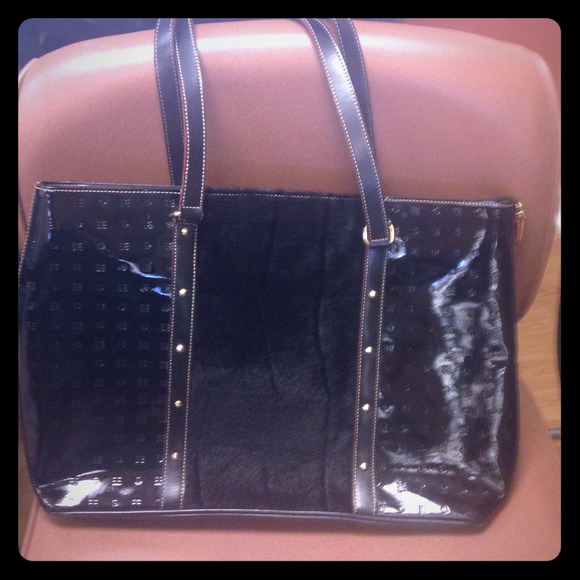 Must see Arcadia Tote. 100 auth and leather . Fur