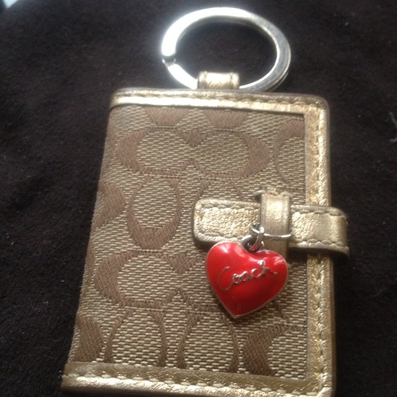 Coach keychain that opens to put money in