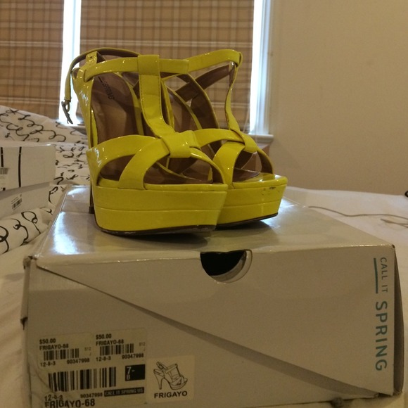 Call It Spring neon yellow sandals.