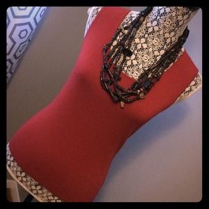 Terra-cotta colored sleeveless top