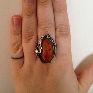 Amber and silver ring.