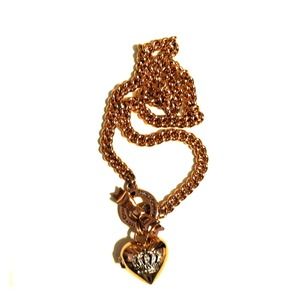 Authentic Juicy Couture rose gold locket