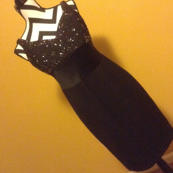 Beautiful black dress nice sequins @ bustline sz.6