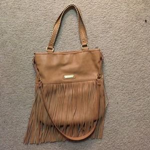 Brown Steve Madden purse with frills.