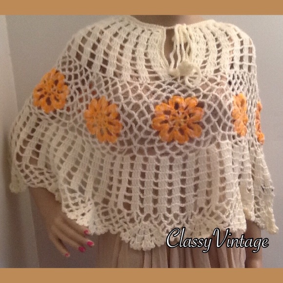 Boutique Jackets & Blazers - Adorable Daisy adorned crocheted cape. NWT