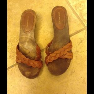 Cute wooden brown sandals.