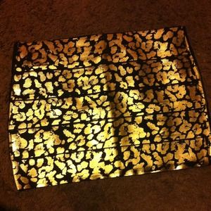 Black and metallic gold body con skirt
