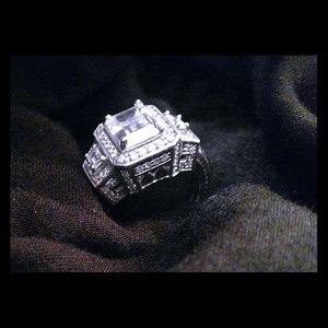 .925 Sterling Silver with hand cut CZ. Ring