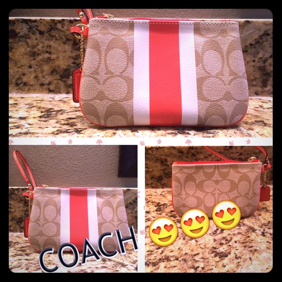 Brand new Orange Coach Wristlet