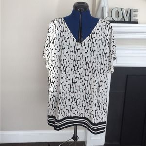 Black and white with some sholder detail blouse