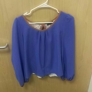 Blue boutique top with bows