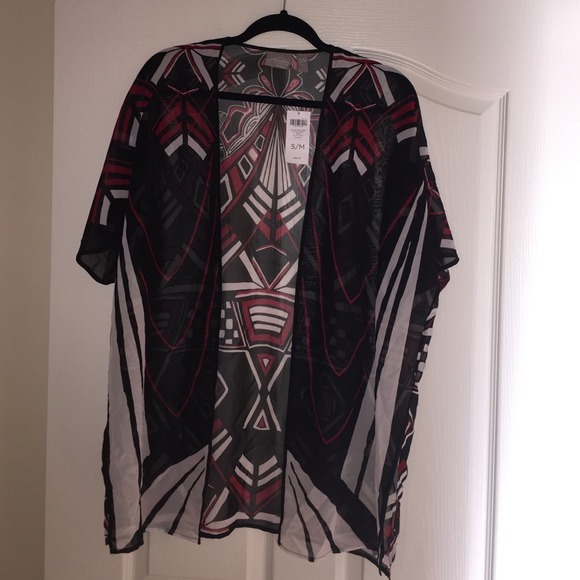 A beautiful cover up/ top by Chico's!