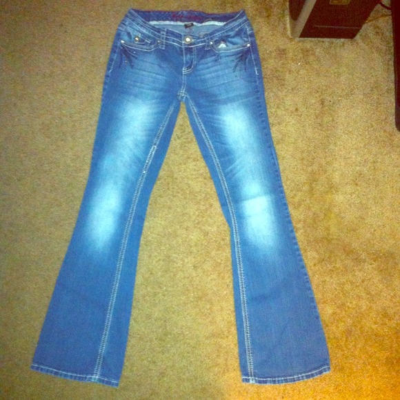 Faded boot cut jeans with black and silver gems!