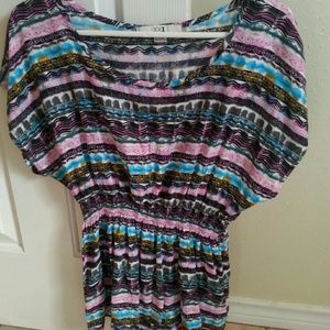 Tribal blouse cinched at the waist