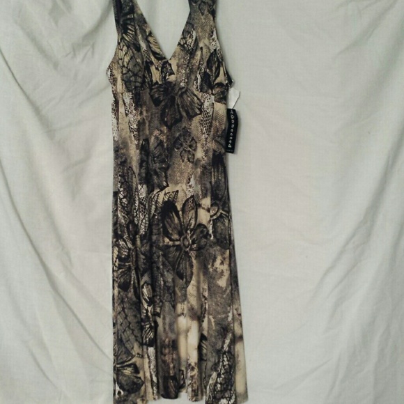 Dress that is snake print with black flowers