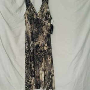 Dress that is snake print with black flowers