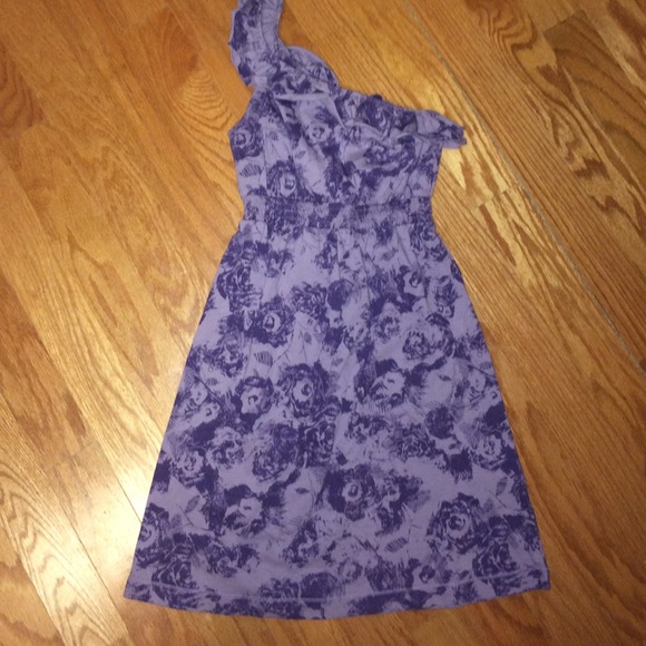 Purple floral one strap dress.