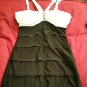 Skin tight black and white dress.