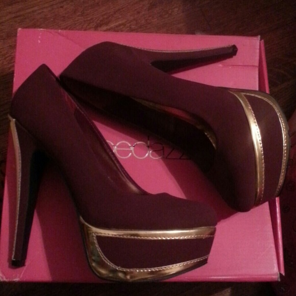 Burgundy heels with gold lining