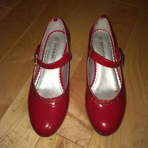 Red w/red glitter. Size 2 children's shoes.