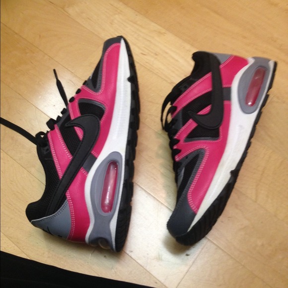 Pink and black nike air maxes