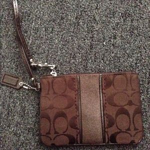 COACH wristlet.